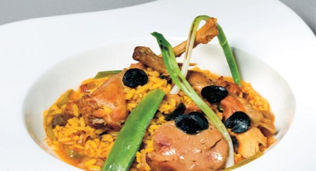 Arroz meloso de conejo, boletus, foie y láminas de trufa valenciana